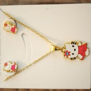 NWOT gold plated stainless steel jewelry set.